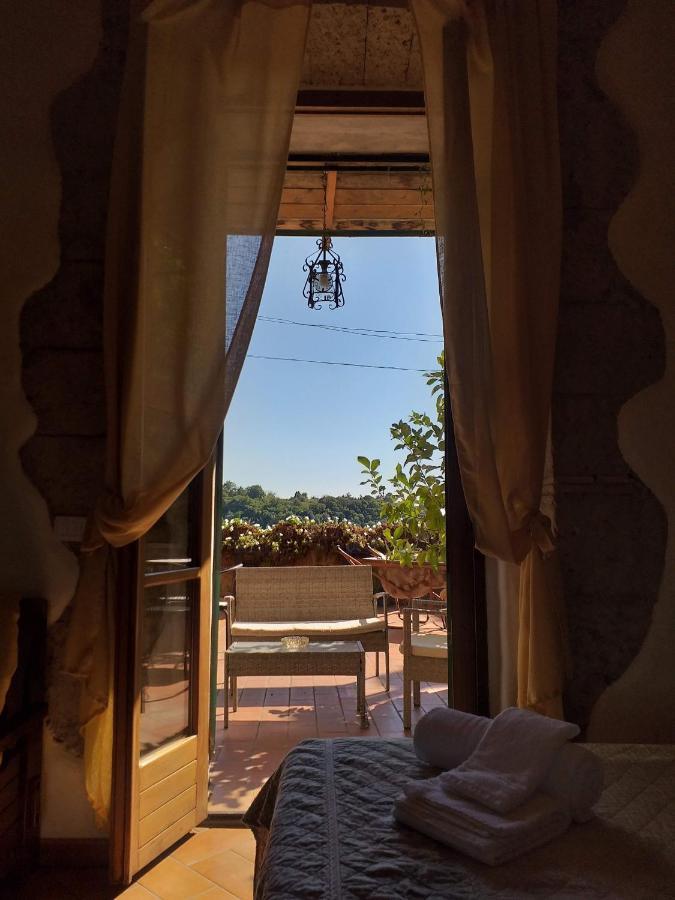 Affittacamere Licenza N.1 Presso La Magica Torre Pitigliano Exterior foto