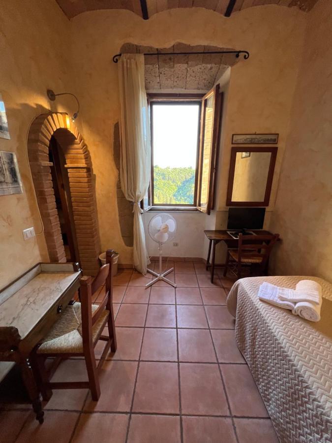 Affittacamere Licenza N.1 Presso La Magica Torre Pitigliano Exterior foto